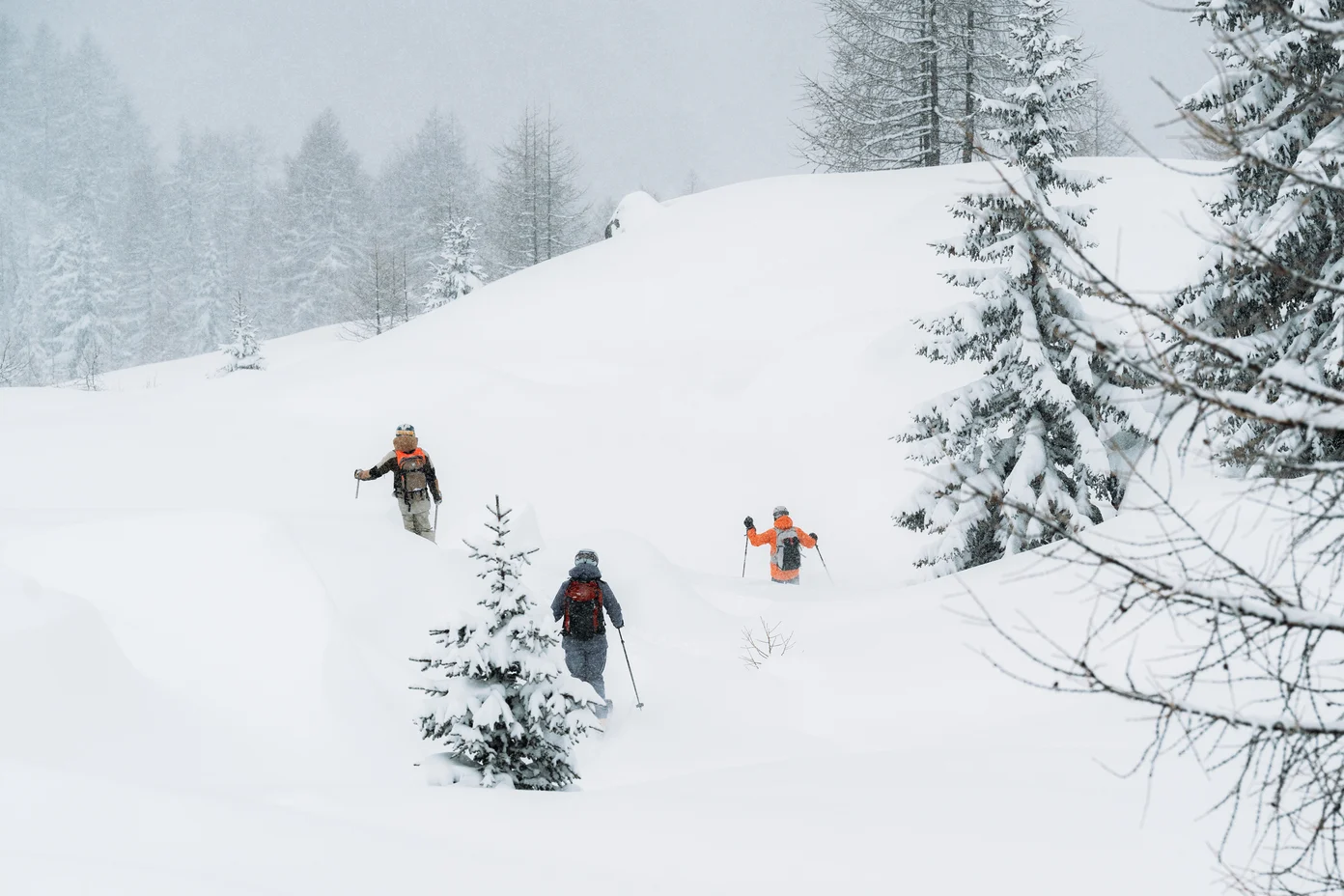 Two skiers tour through the French Alps.