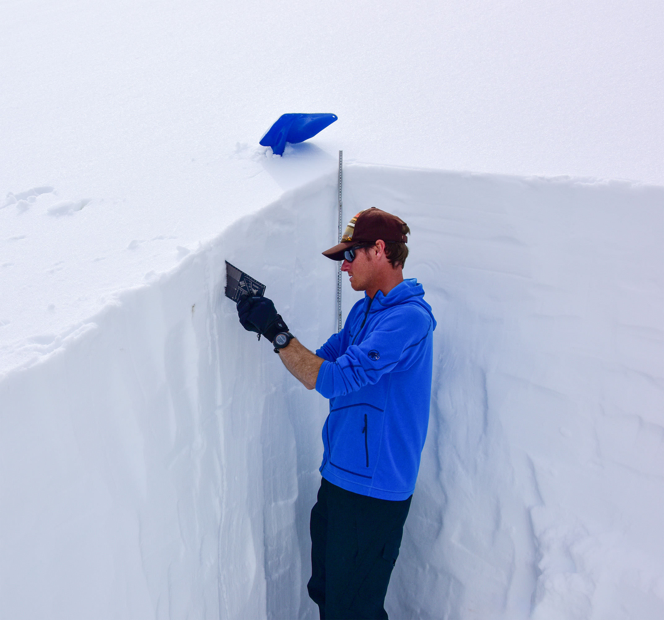 Ski guide practicing avalanche safety