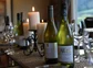 Two bottles of local New Zealand wine on a table ready for tasting.