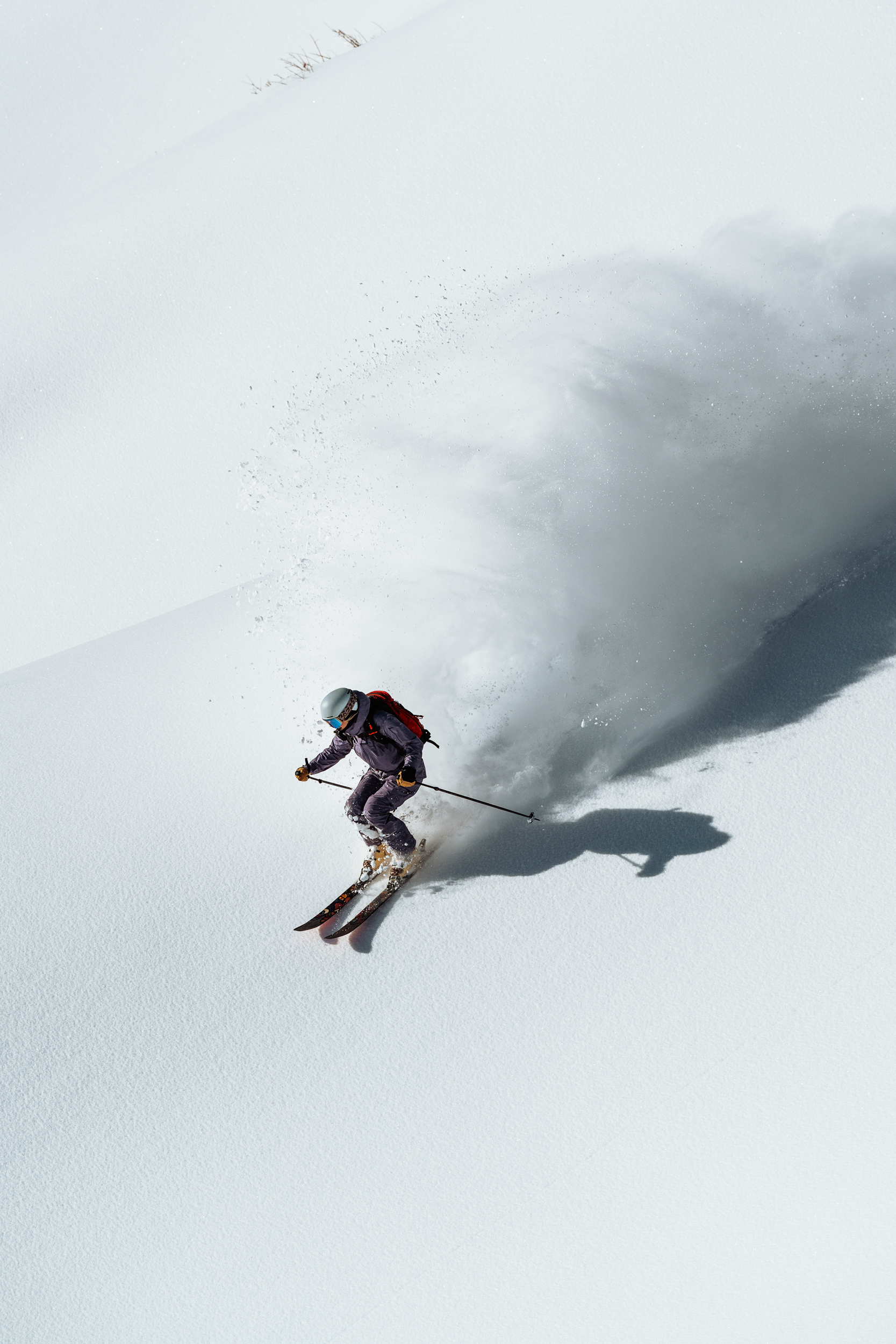 A person skiing down steep French Alp.