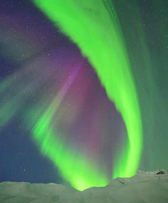 Northern Lights over mountains