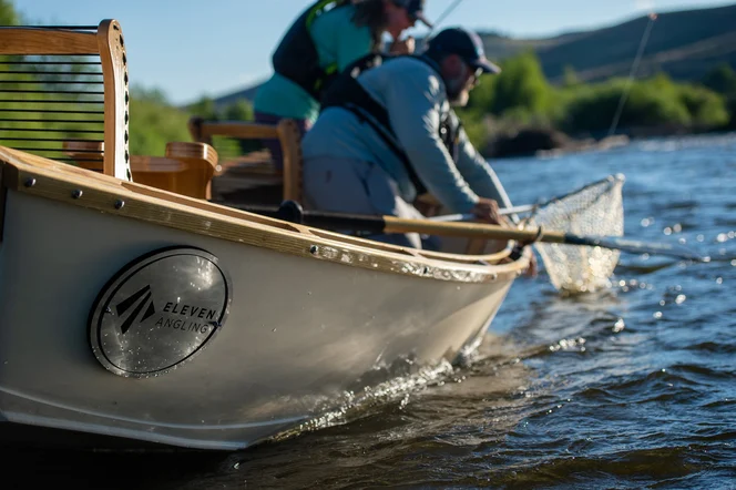 An angler nets a fish on the Gunnison River.