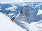 A person skiing downhill in a Chilean mountain range.
