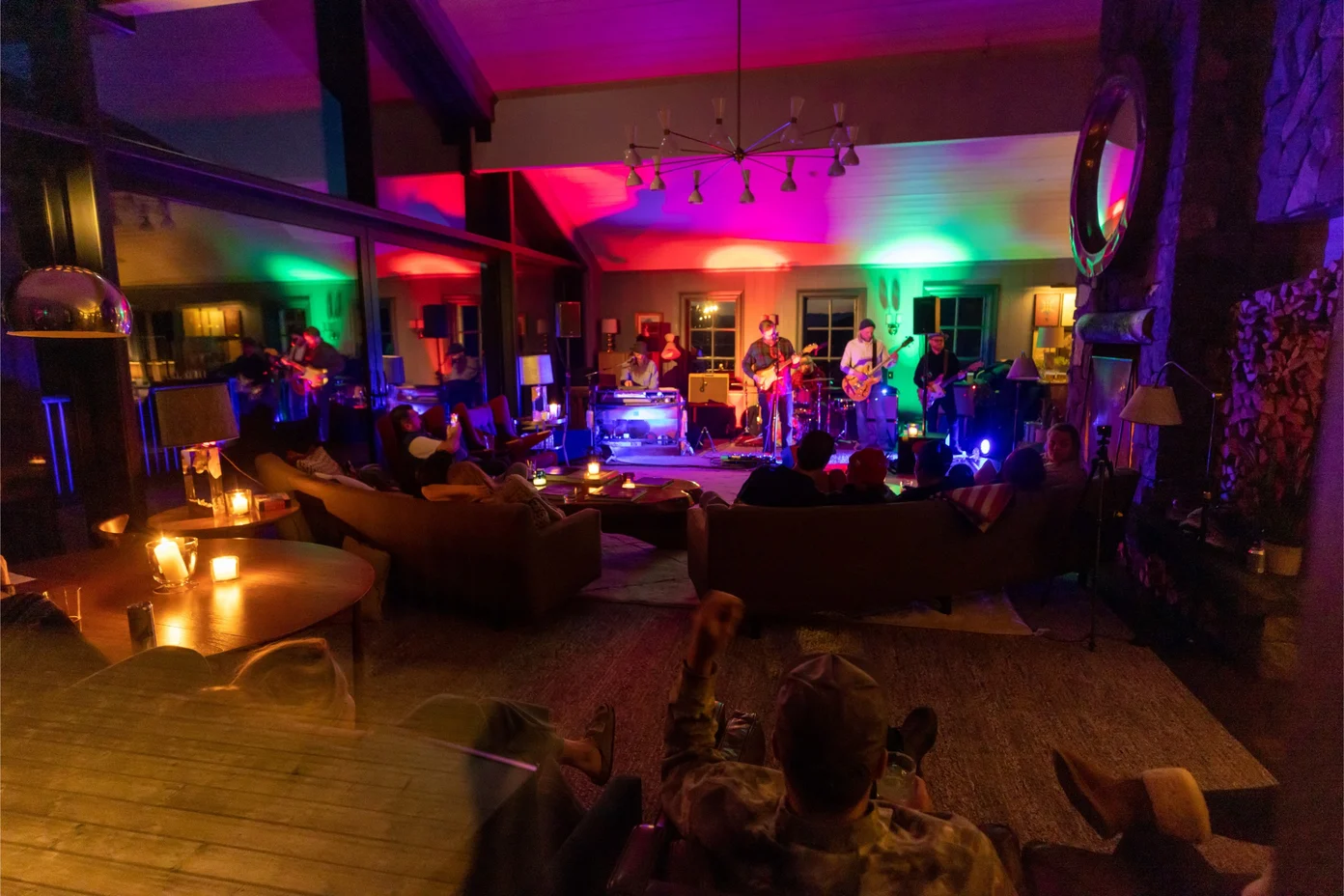 A private indoor concert at a lodge.