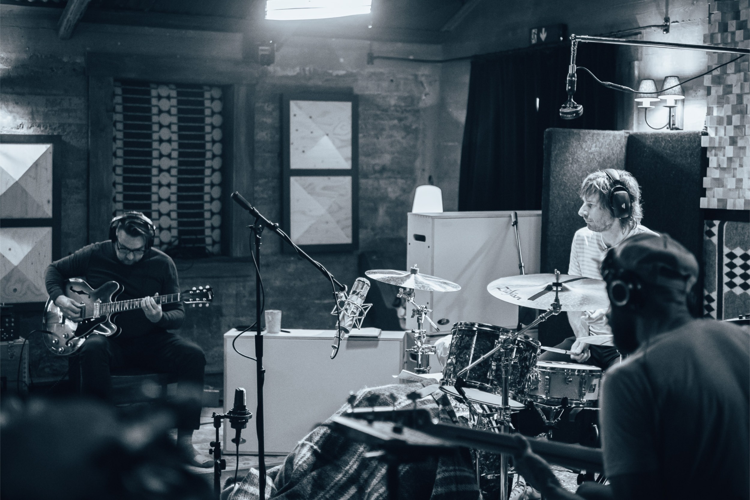 A full band recording a live session.