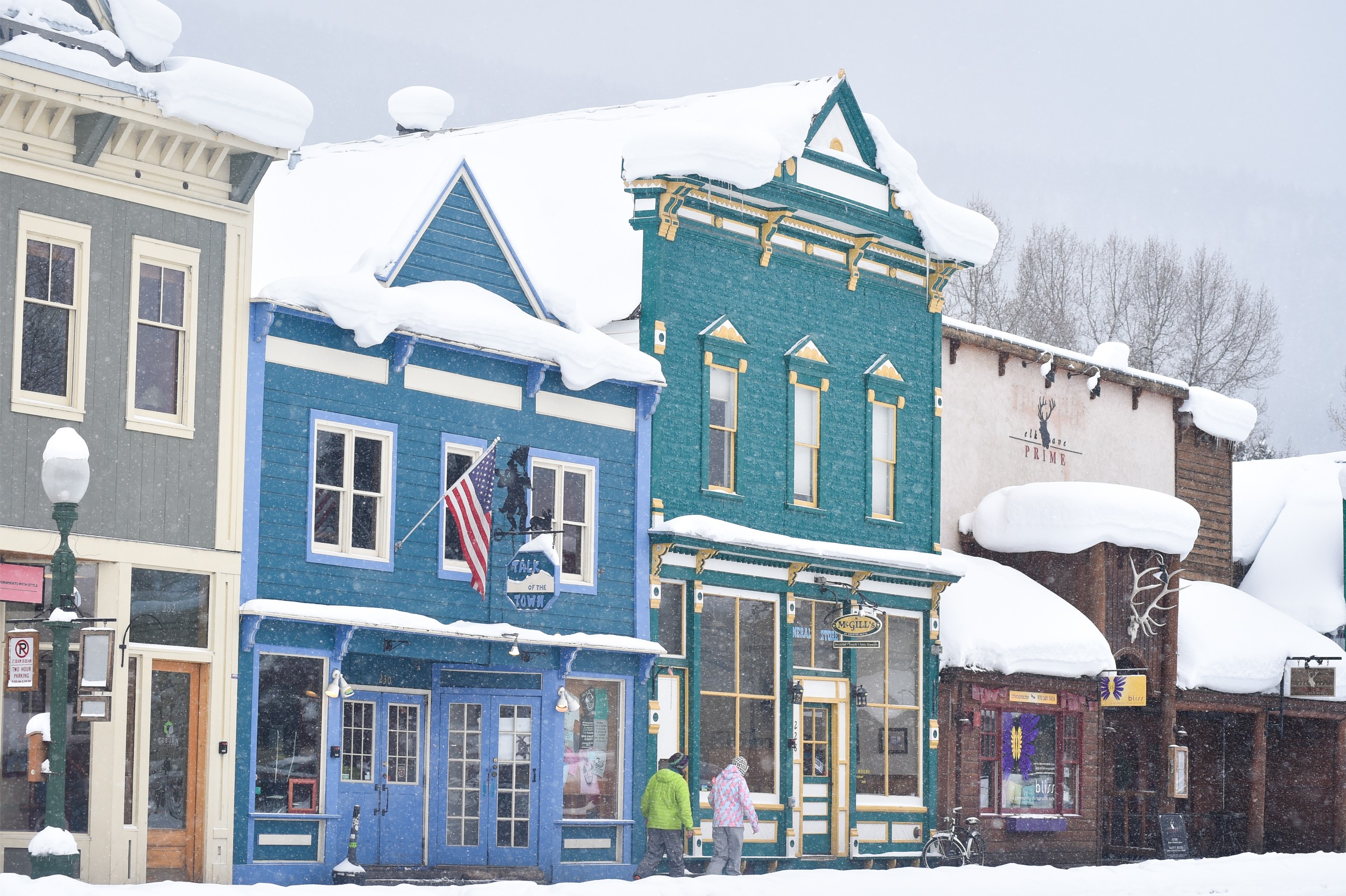 Snow falling on local storefronts in Crested Butte.