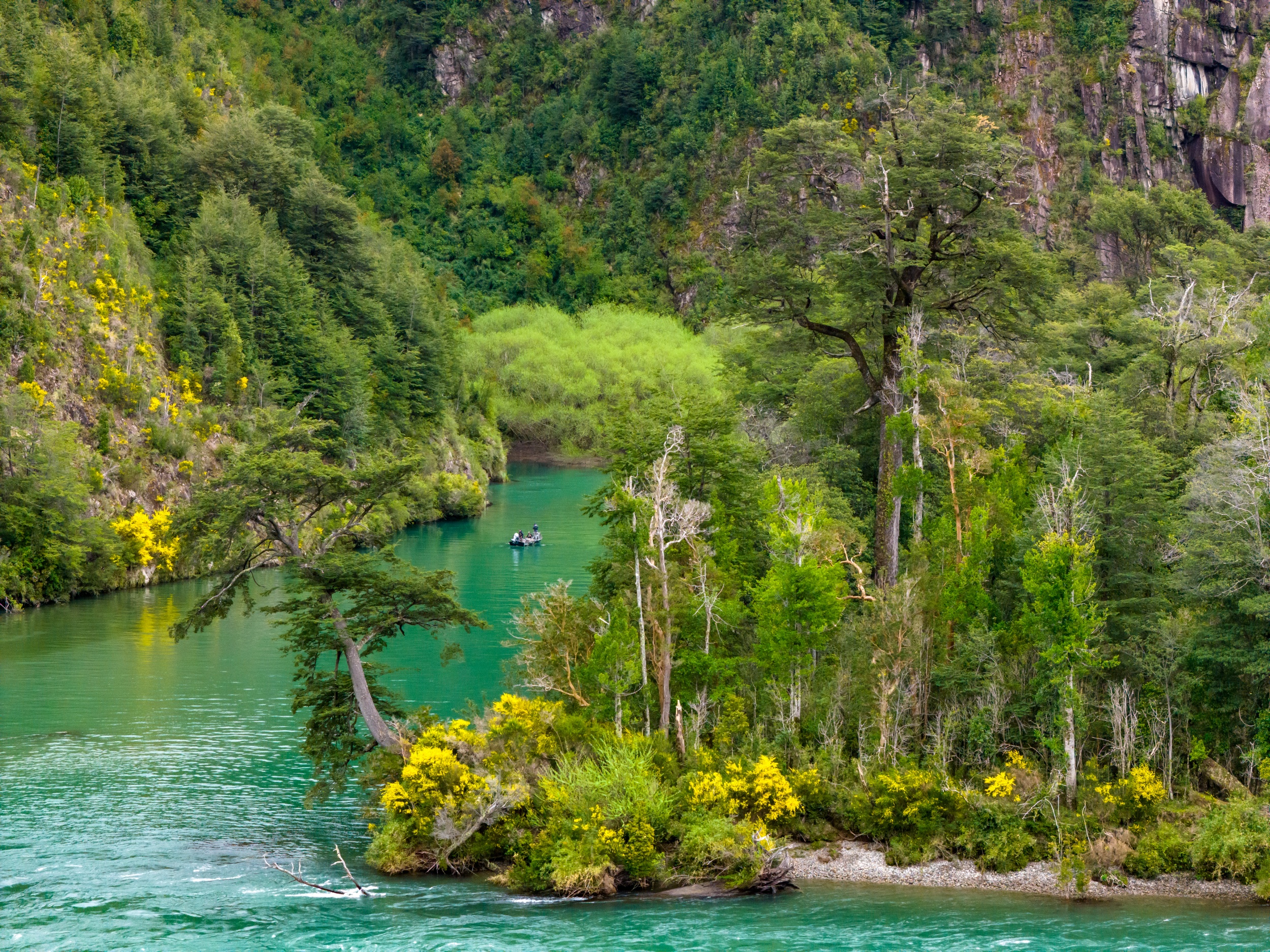 Anglers float down a Patagonian river.