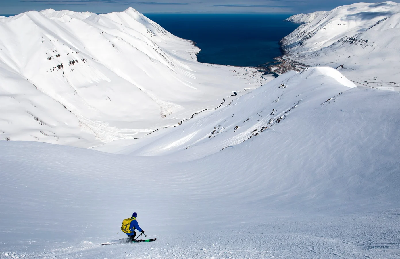 A skier descends in Iceland.