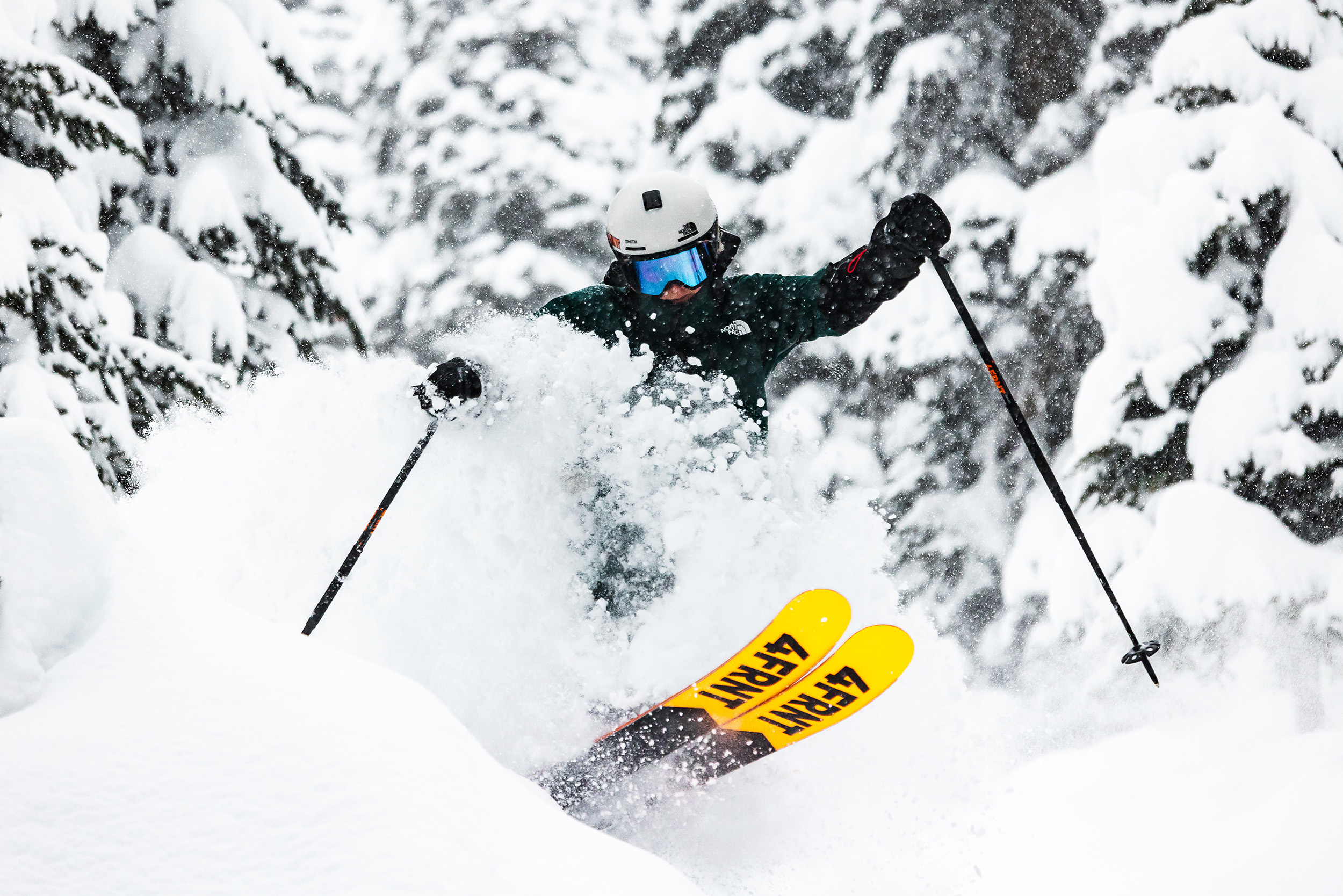 Person skiing pow at Revelstoke Resort.