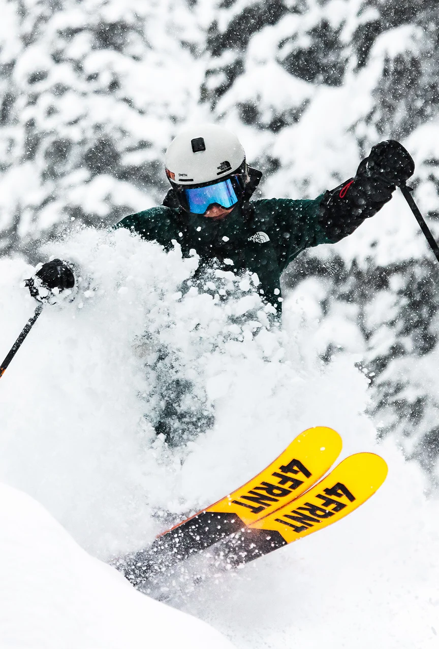 Person skiing pow at Revelstoke Resort.