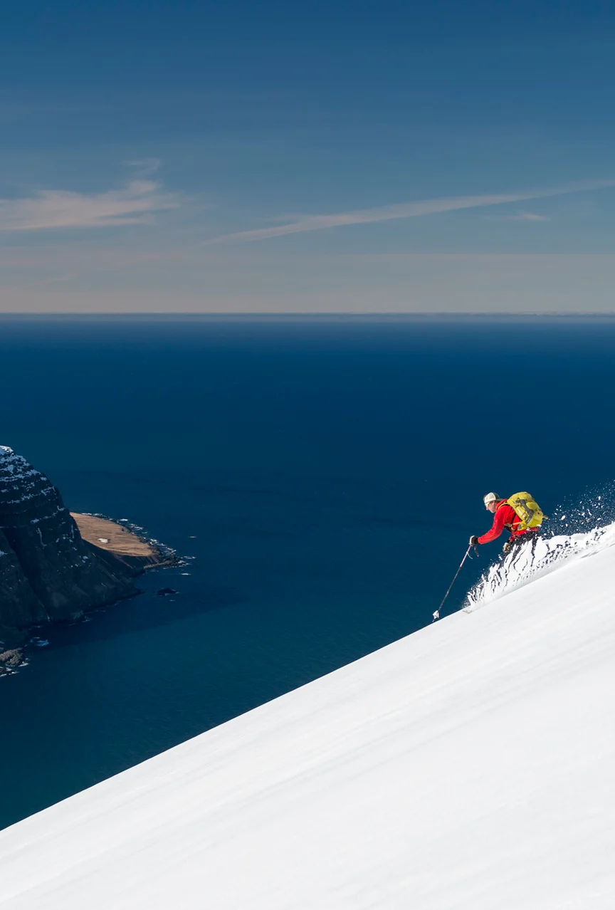 Heliskiing by the sea in Iceland.