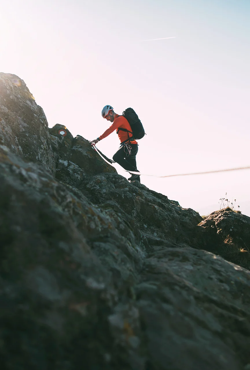 Man climbing mountain